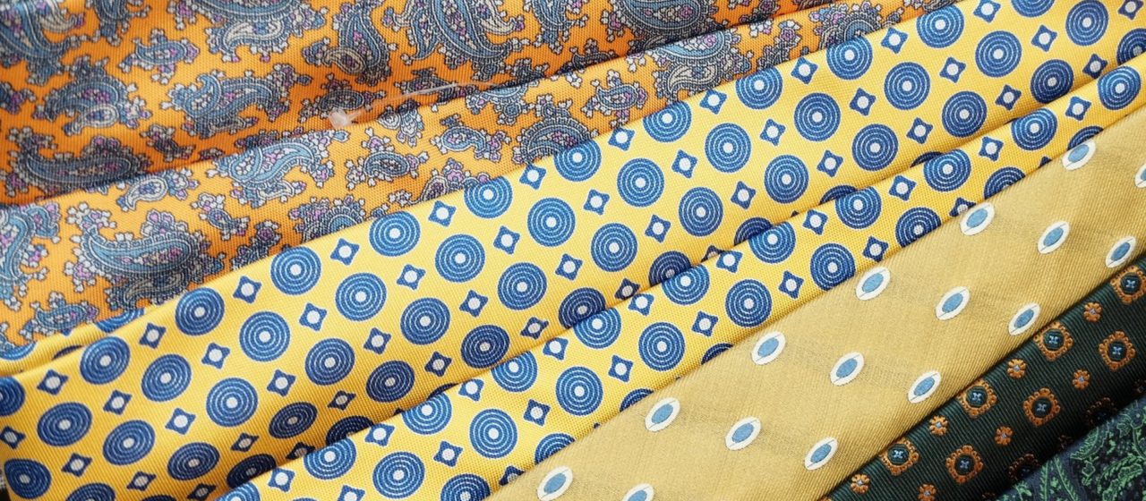 Dress shirts and neckwear displayed at The Man's Shop