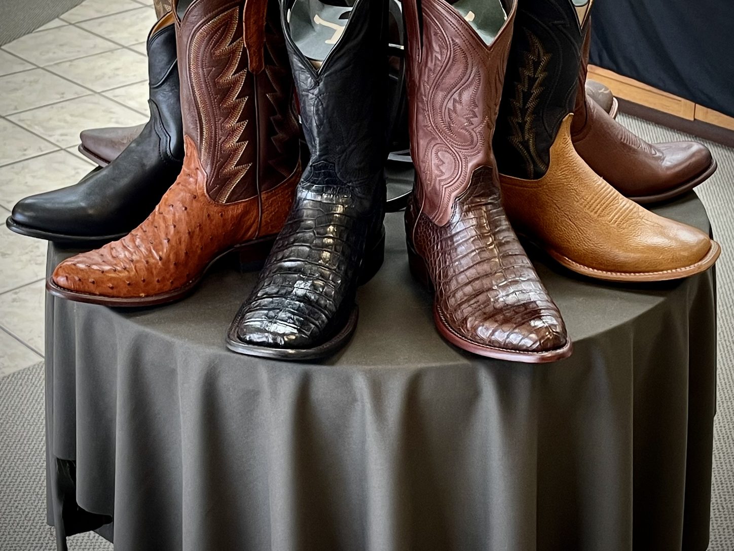 Tecovas cowboy boot display table at The Man's Shop, Arlington, Texas